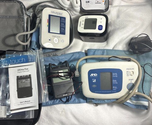 Lot of 4 Health Monitoring Devices. Not Tested Parts Only Ultima A&D And Ormon.